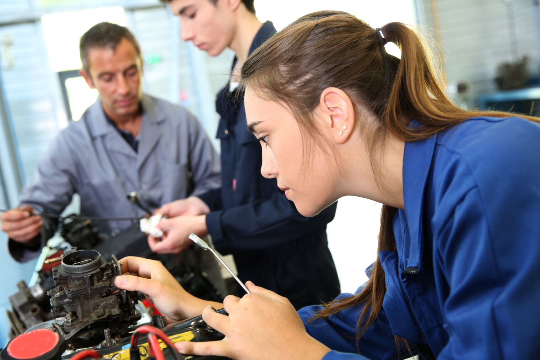 A female student on a Motor Vehicle Mechanical Repair course.