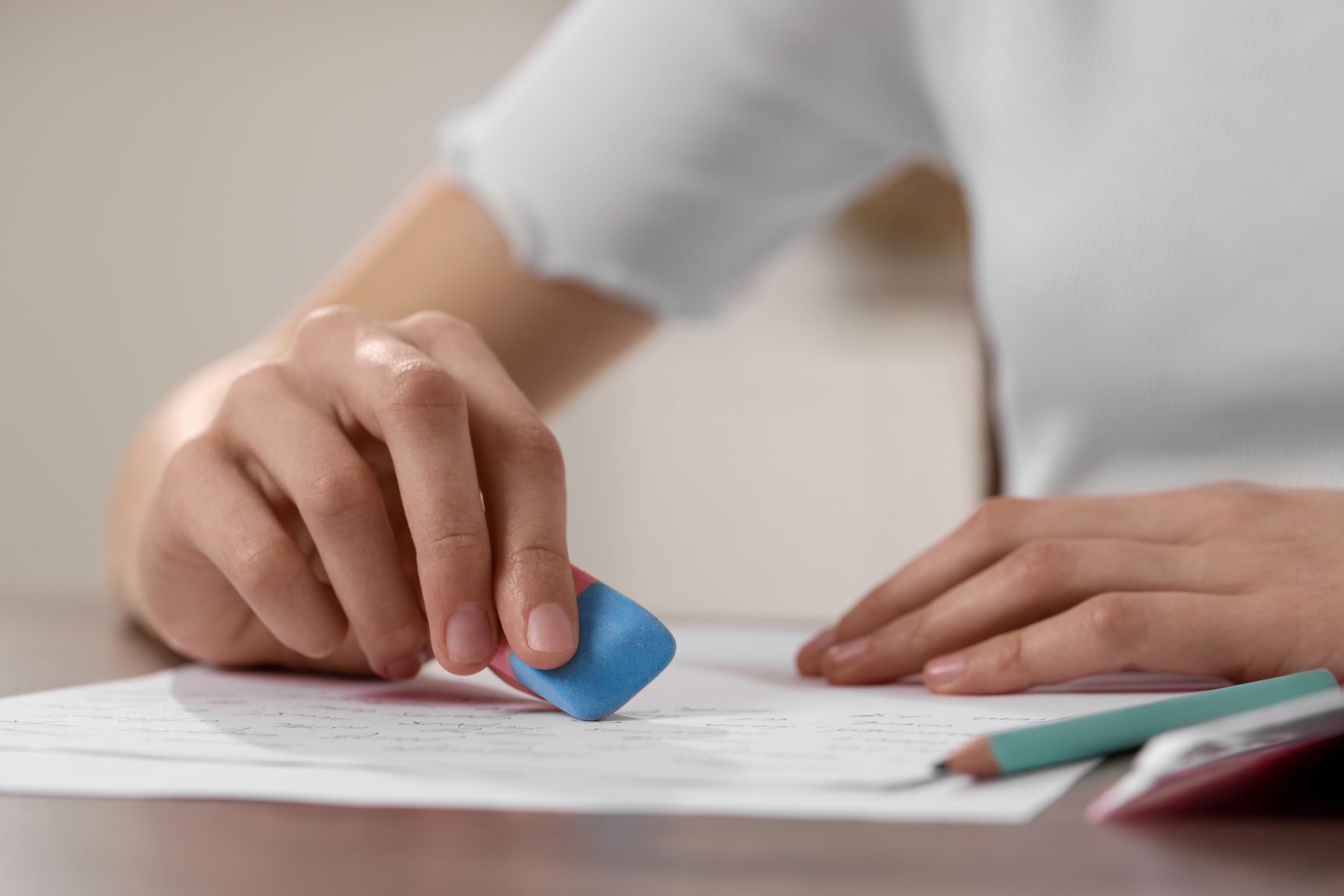 Student using a rubber in an exam.