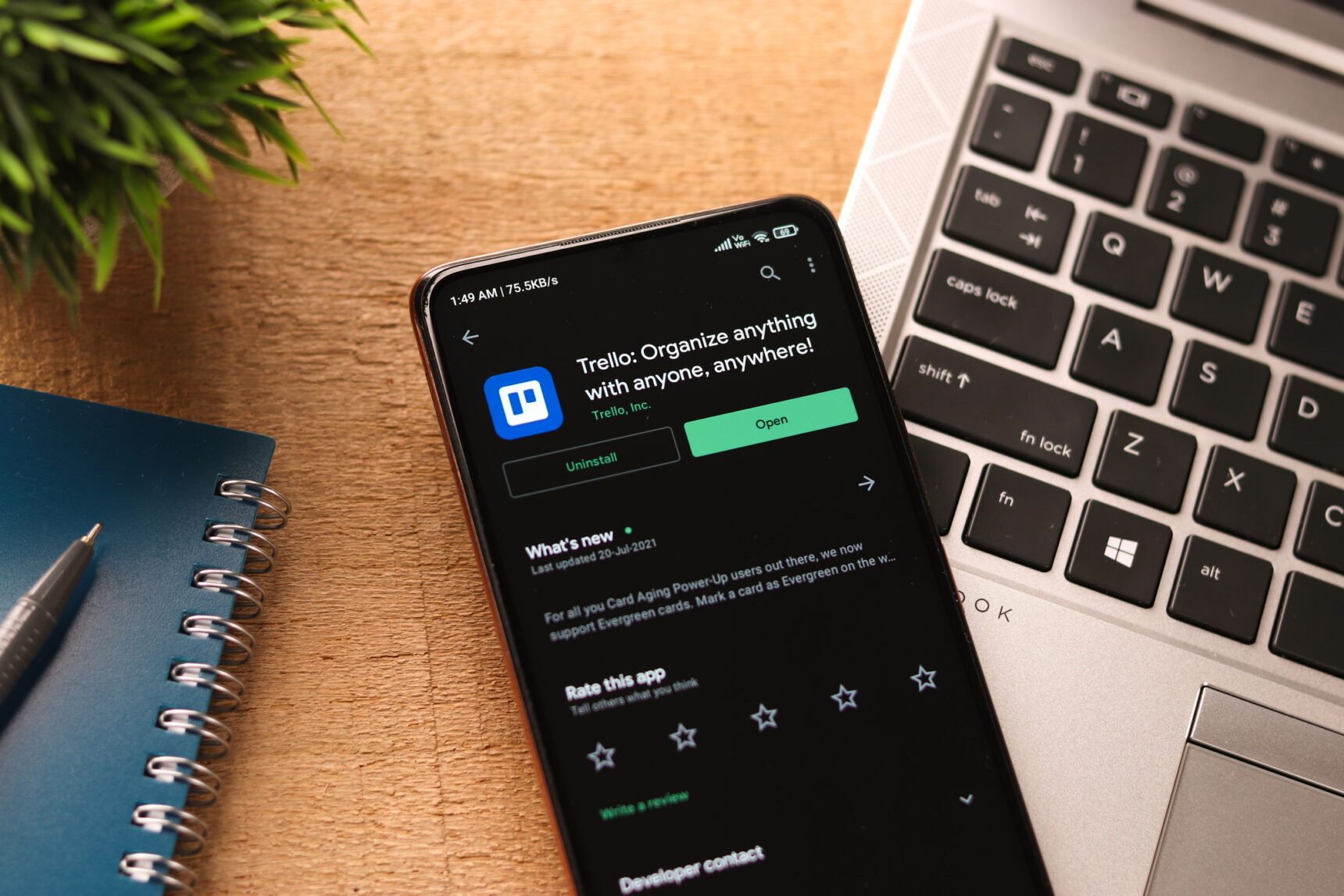A mobile phone showing the Trello app, one of the best teacher apps for planning and organisation.