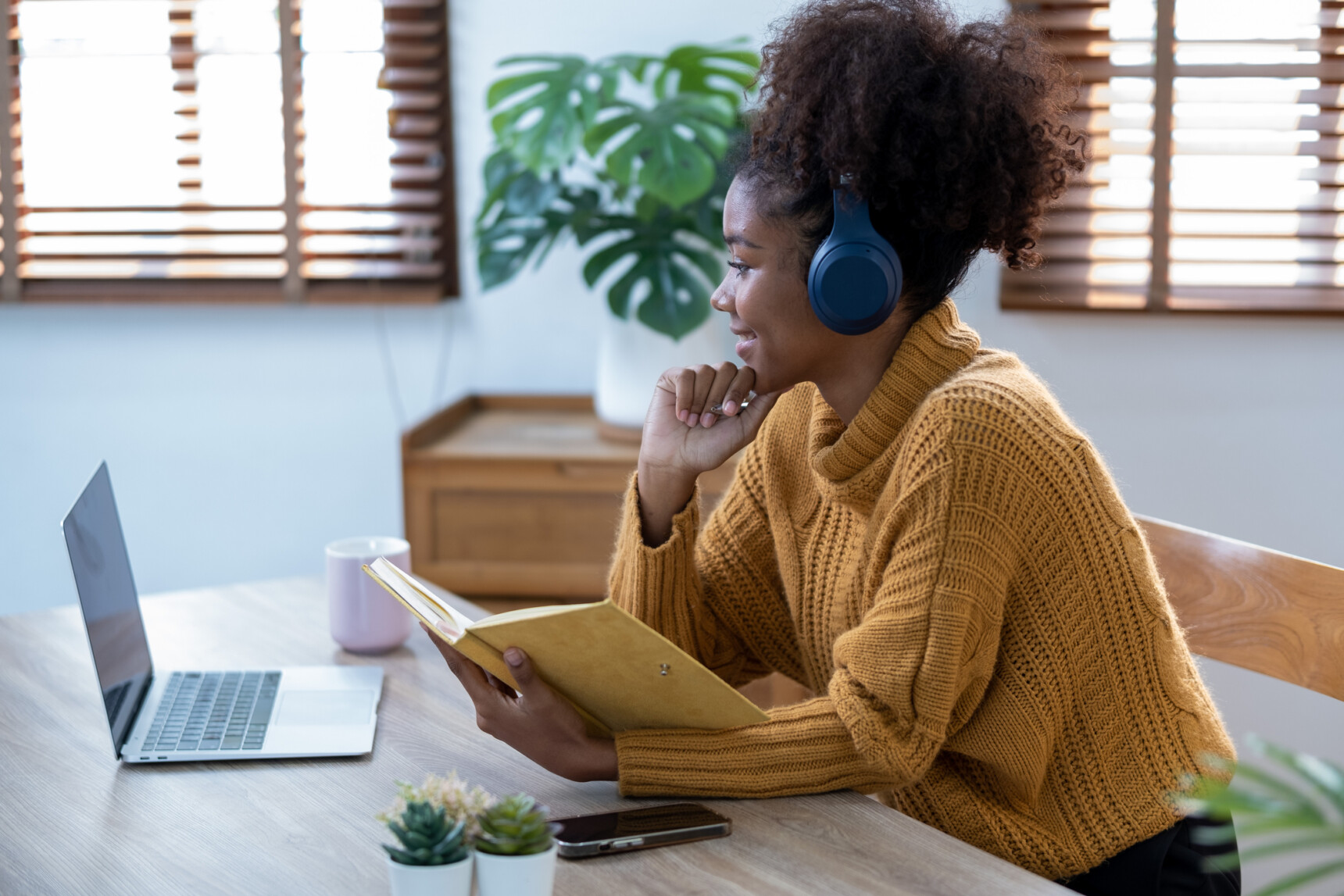 A female university student is having an interview with an online tuition platform to become an English tutor.